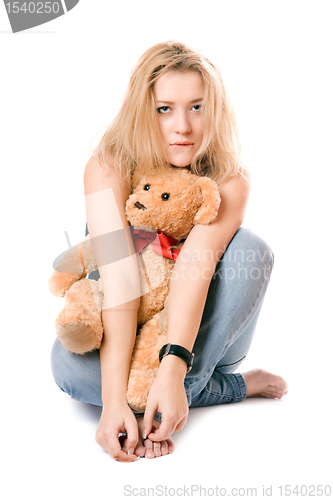 Image of Pretty blonde with a teddy bear