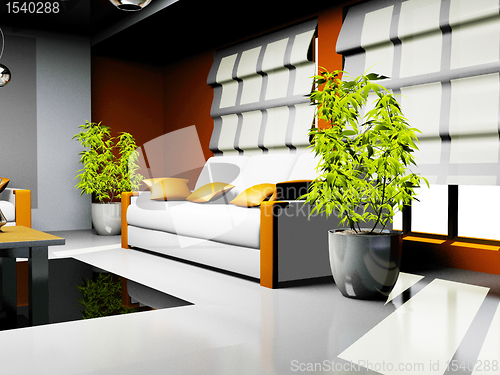 Image of waiting room with orange and white leather furniture 