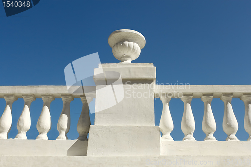 Image of Old concrete park fence