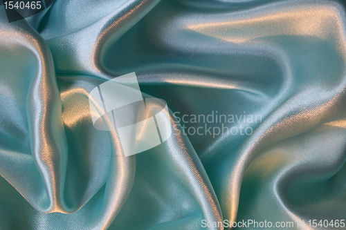 Image of Smooth elegant blue silk as background