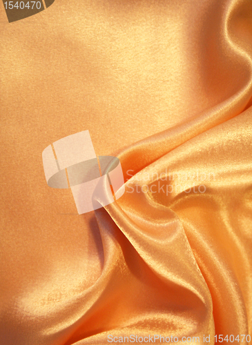 Image of Smooth elegant golden silk as background