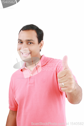 Image of Portrait of a happy young man showing good job sign against whit