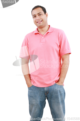 Image of Portrait of handsome man posing with hands in pockets