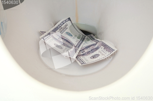 Image of Fake Money in Water Closet