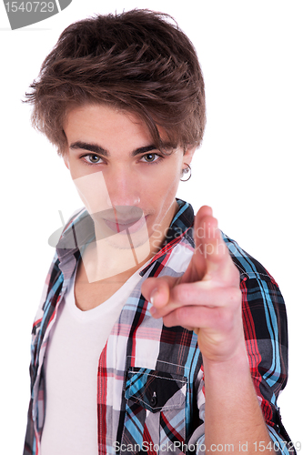 Image of Happy young man pointing