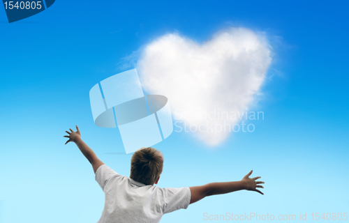Image of Boy with the open hands to the sky