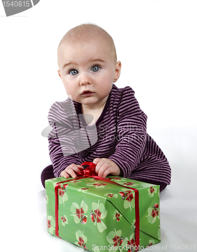 Image of young child with gift
