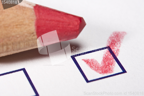 Image of red pencil - checked