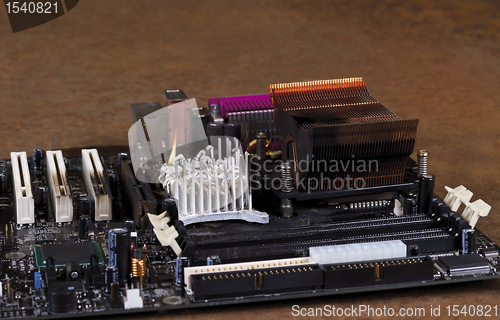 Image of molten cooling element on computer main board