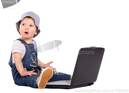 Image of Little boy with a laptop