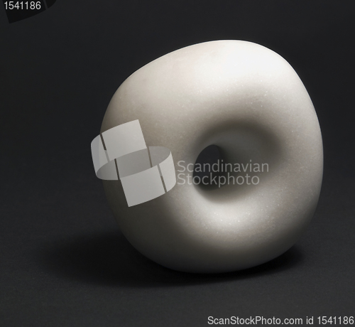 Image of marble stone sculpture on black