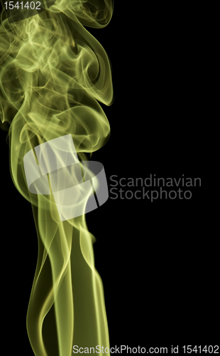 Image of green smoke in black back