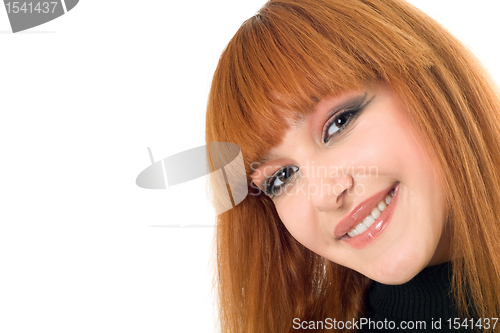 Image of Portrait of the attractive smiling redheaded woman