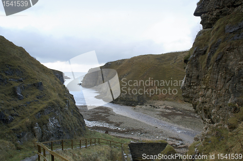 Image of rocky seaside scenery with stairs