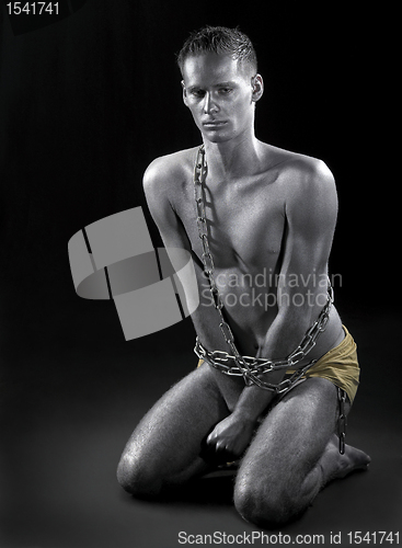 Image of chained man