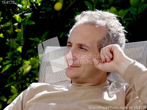 Image of A middleage man with gray hair