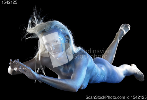 Image of blue bodypainted woman and fabrics