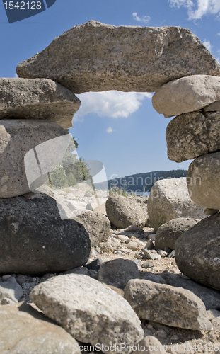 Image of pebble archway at summer time