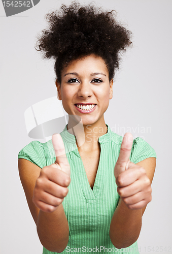 Image of Beautiful woman with thumbs up