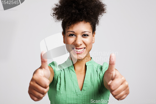 Image of Beautiful woman with thumbs up