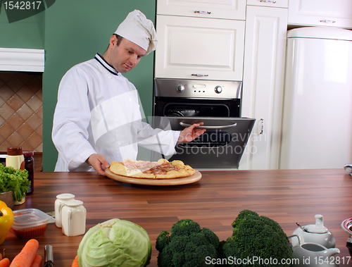 Image of Chef and pizza