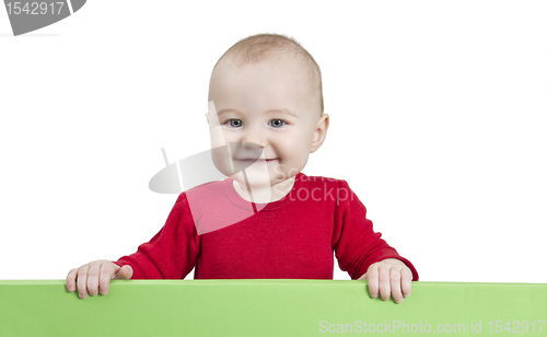 Image of young child holding shield