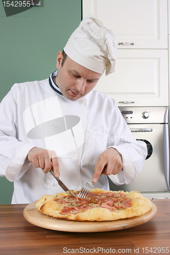 Image of Chef and pizza
