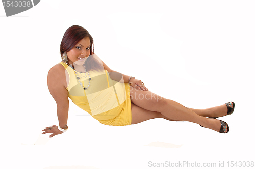 Image of Woman sitting on floor.