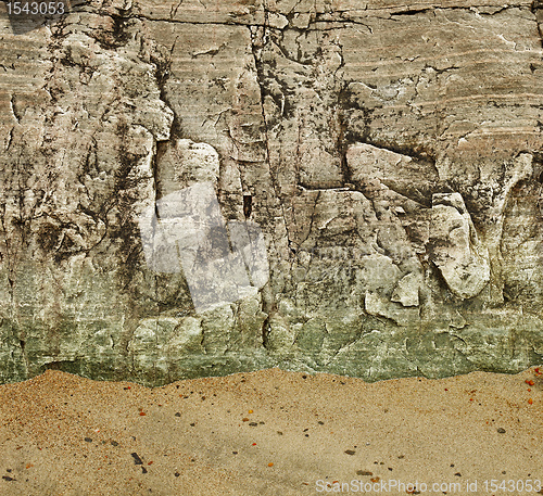 Image of Granite rock on a sandy beach
