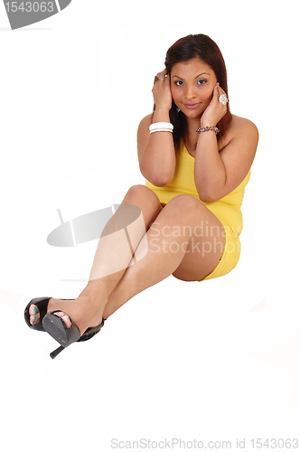 Image of Girl sitting on floor.