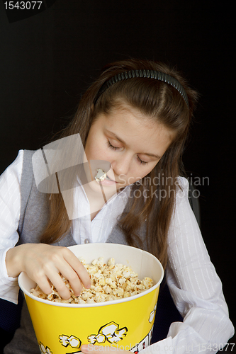 Image of girl asleep in a movie theater