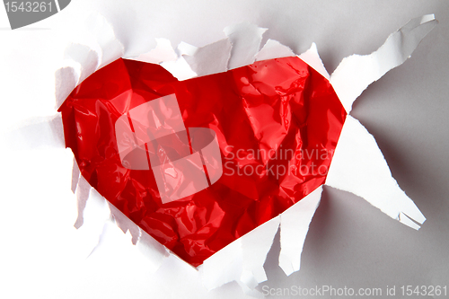 Image of red heart in the white paper
