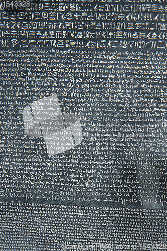 Image of old letters in the stone