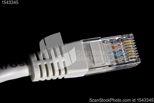 Image of network plug in black background