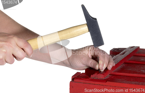 Image of hammering hand