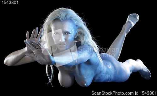 Image of blue bodypainted woman and fabrics