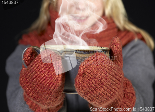 Image of woman and hot cup