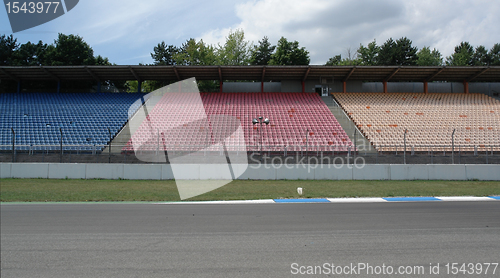 Image of racetrack tribune with seat rows