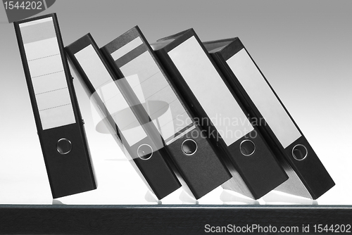 Image of folders on desk surface