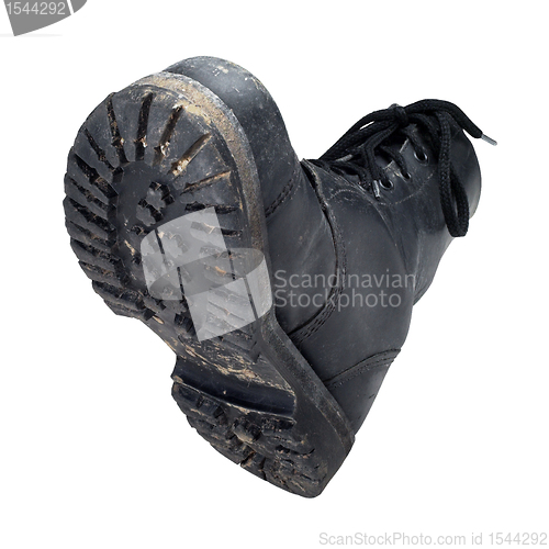 Image of dirty old combat boot