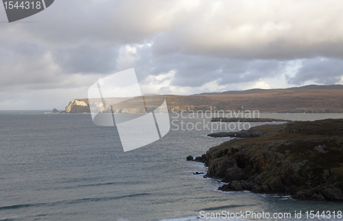 Image of rocky coast in Scotland at evening time