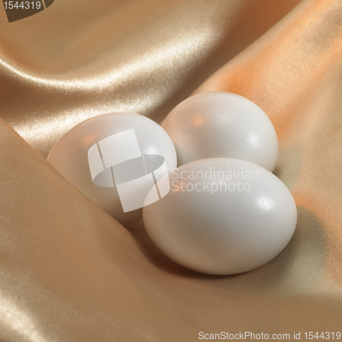 Image of eggs on satin