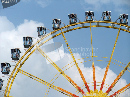 Image of detail of a colorful big wheel
