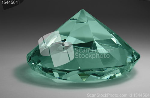 Image of green diamond in gradient back