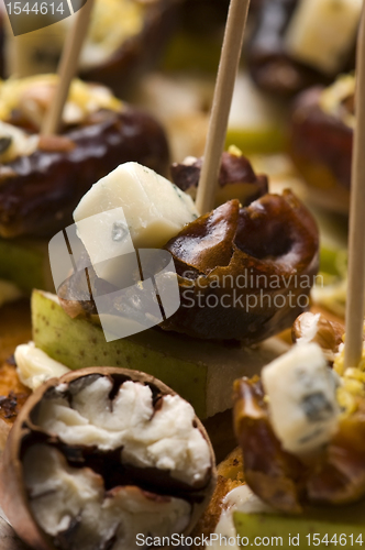 Image of Appetizer Plate with Dactyl, Pecan nuts and Cheese