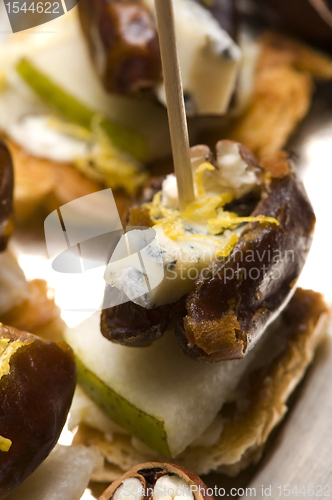 Image of Appetizer Plate with Dactyl, Pecan nuts and Cheese