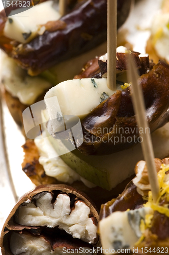 Image of Appetizer Plate with Dactyl, Pecan nuts and Cheese