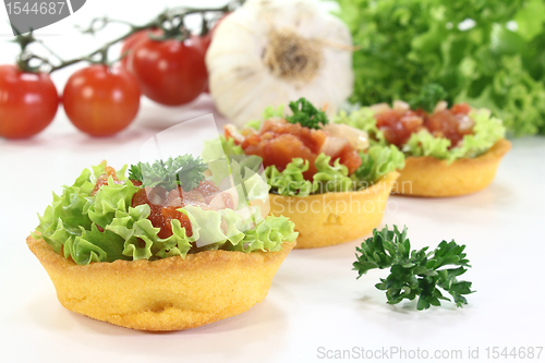 Image of baked cup corn with tomato salsa