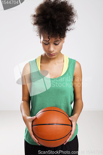 Image of Woman with basketball