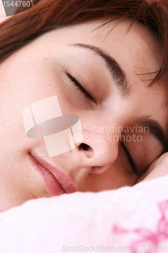 Image of Beautiful young woman sleeping.